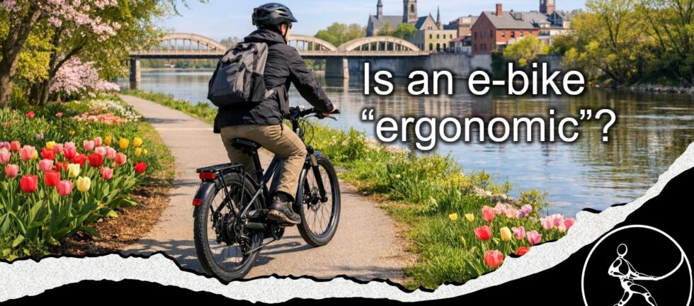 Image of a man riding an ebike on a trail in spring